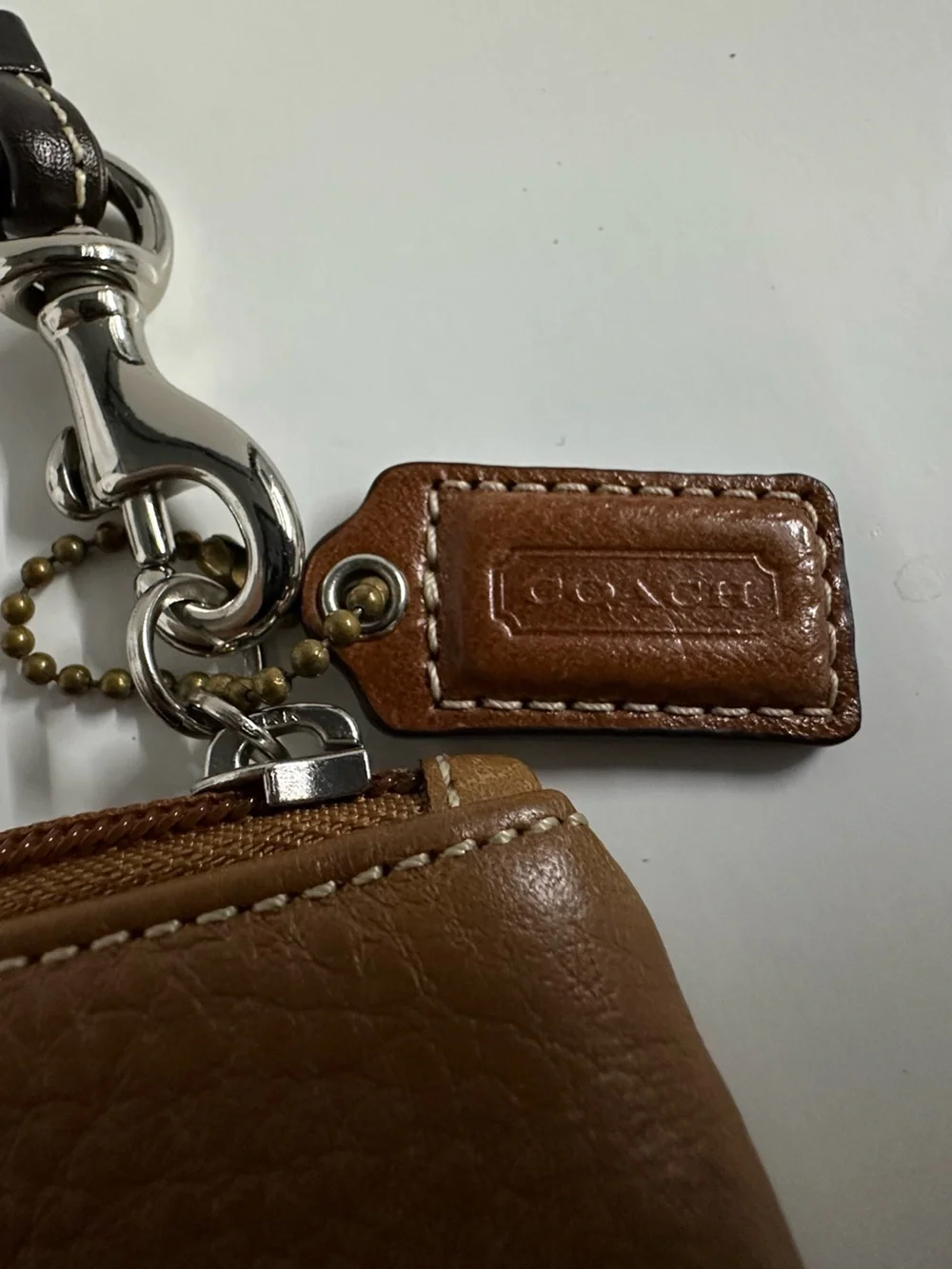 Coach Dark Tan Pebbled Leather Wristlet